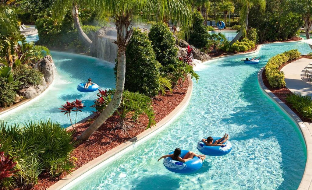 Looking from the top of a pool slide towards the Hilton Grand